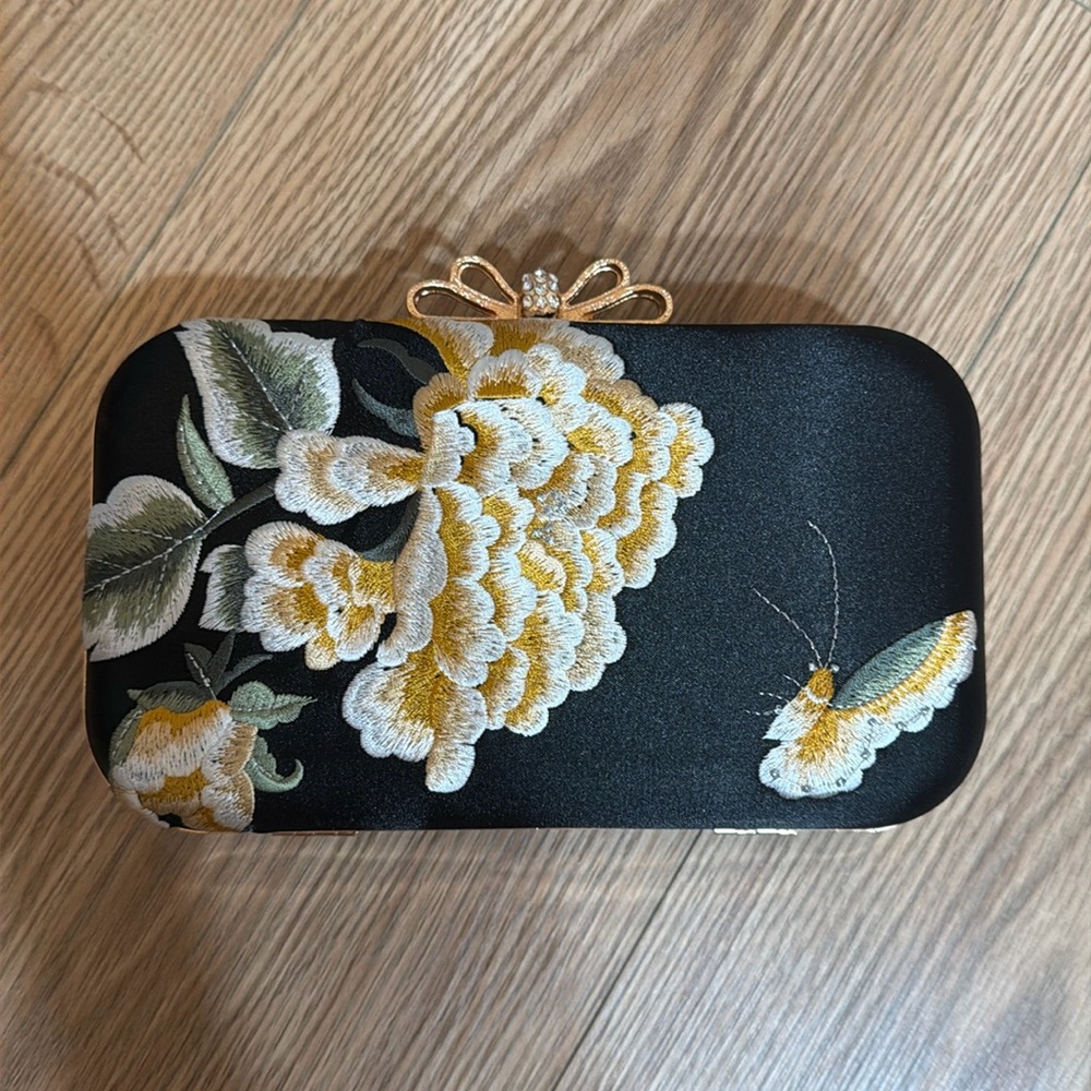 Satin finished clutch with rose gold hardware